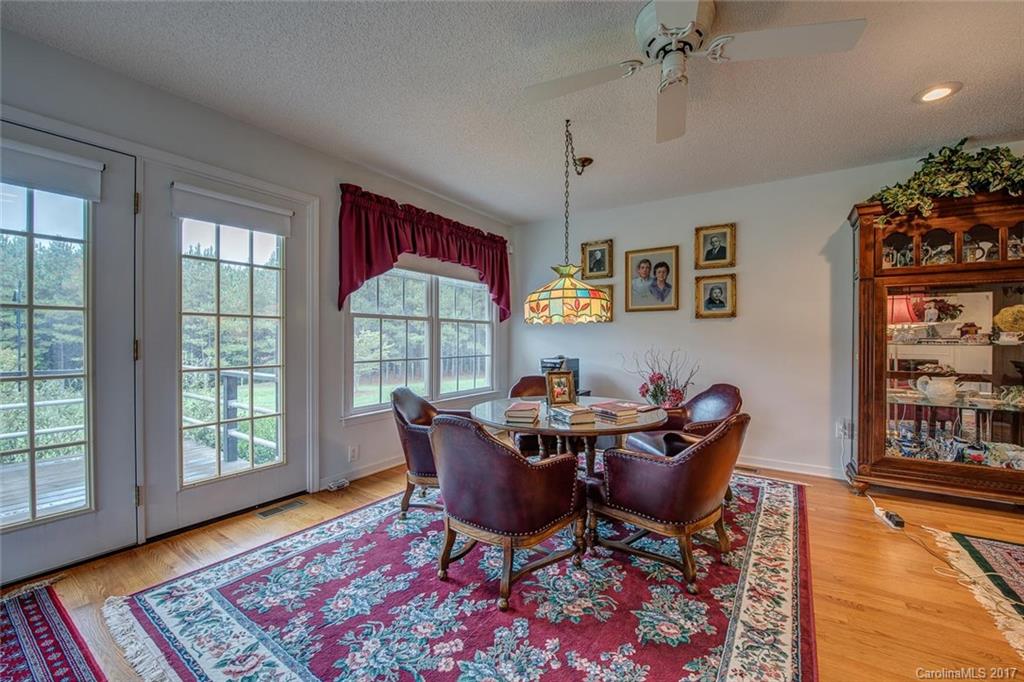 404 Loray Farm Road Dallas, NC 28034 - Photo 8 of 23 a dining room with furniture and wooden floor