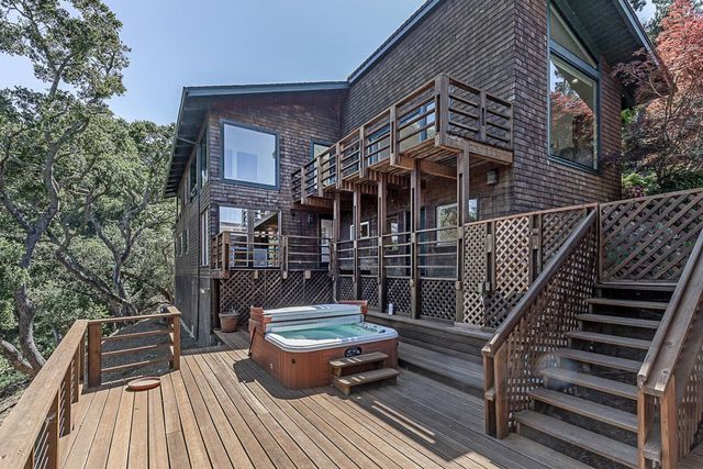 a front view of a house with chairs