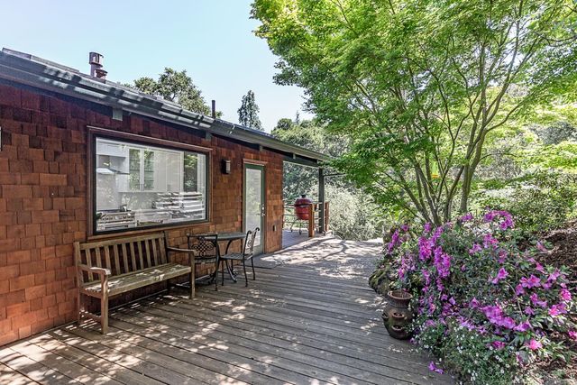 a view of a bench in the roof deck