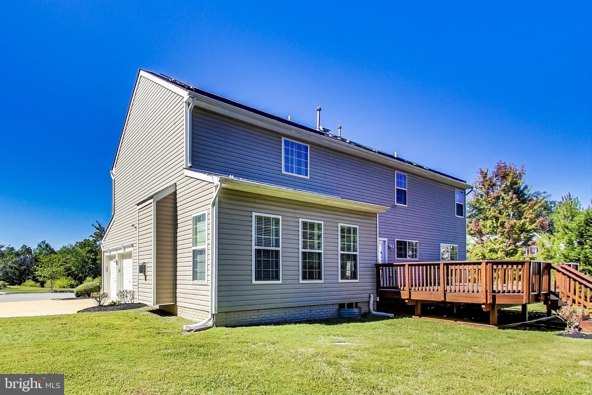 16708 Mannington Road Accokeek, MD 20607 - Photo 44 of 54 Rear View of Home with Large Deck and Yard