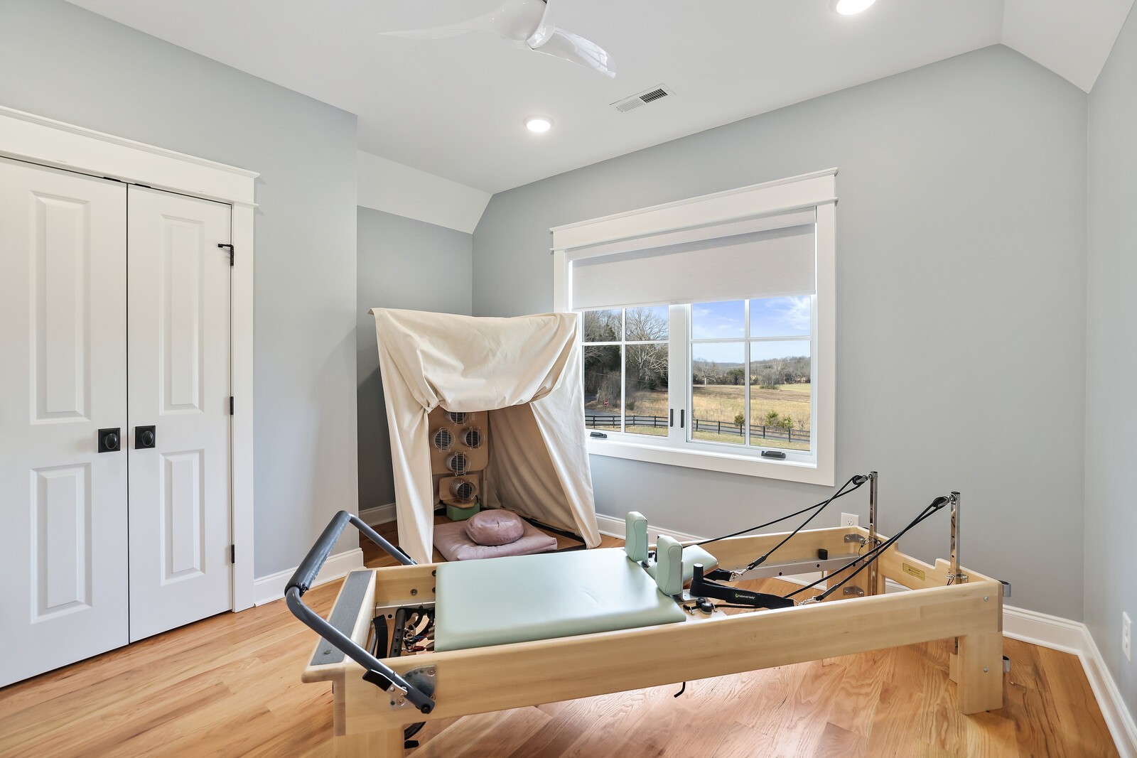 3755 Holmes Gap Road Watertown, TN 37184 - Photo 28 of 71 a room with gym equipment and wooden floor