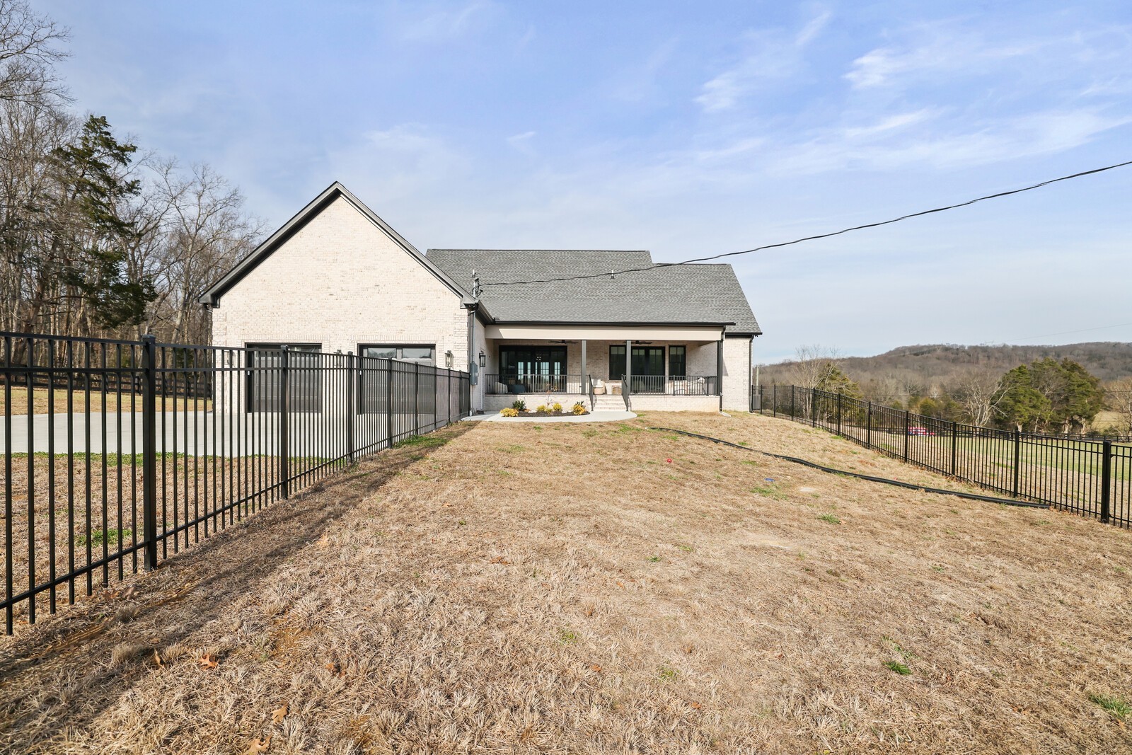 3755 Holmes Gap Road Watertown, TN 37184 - Photo 40 of 71 a view of house with backyard and trees in the background