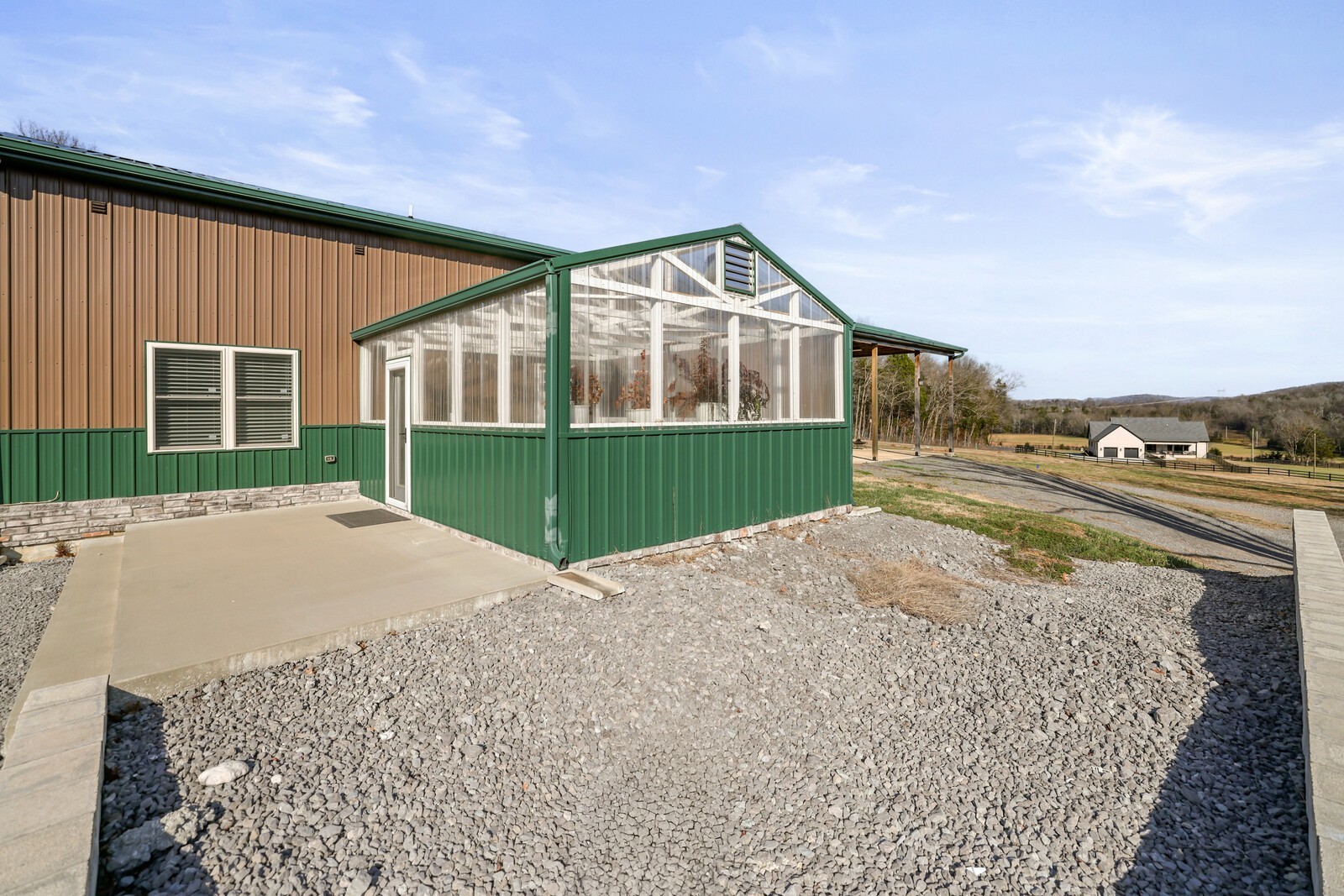 3755 Holmes Gap Road Watertown, TN 37184 - Photo 58 of 71 a front view of a house with a yard and garage