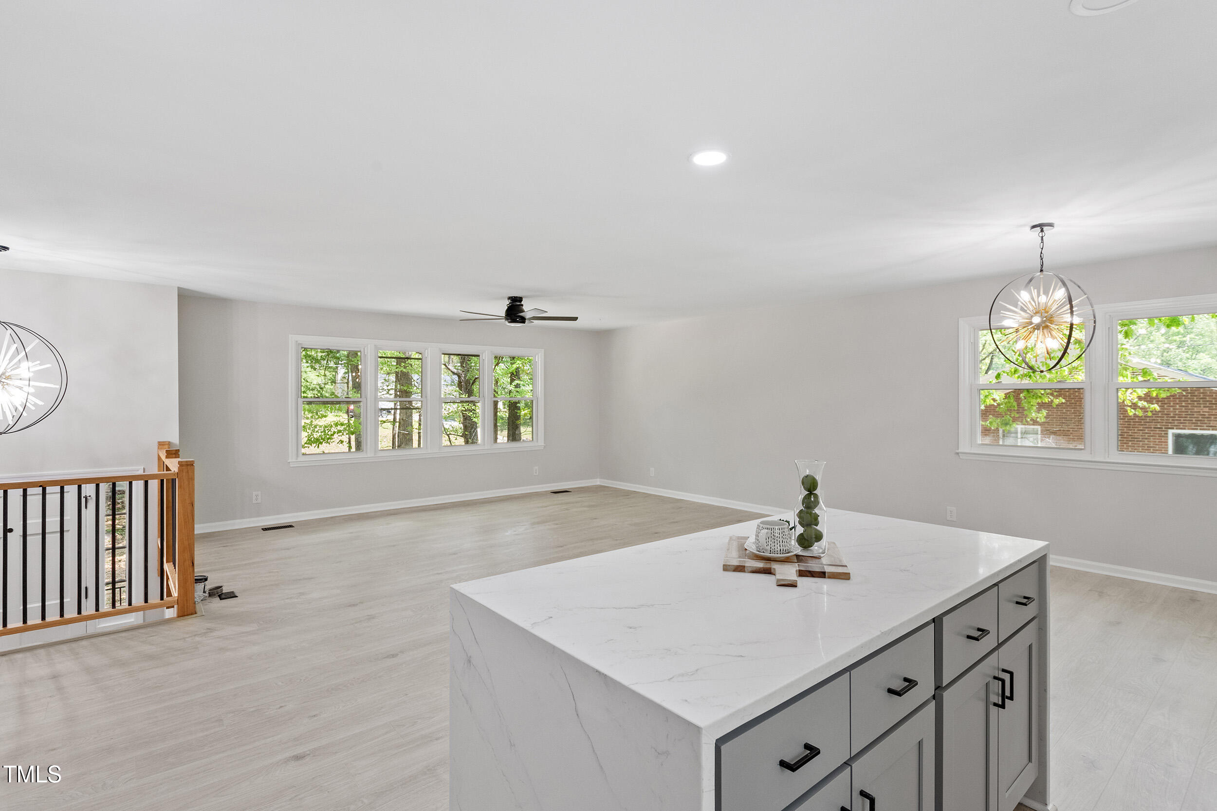1514 Goodwin Road Durham, NC 27712 - Photo 12 of 33 an view of kitchen with a sink windows and a chandelier