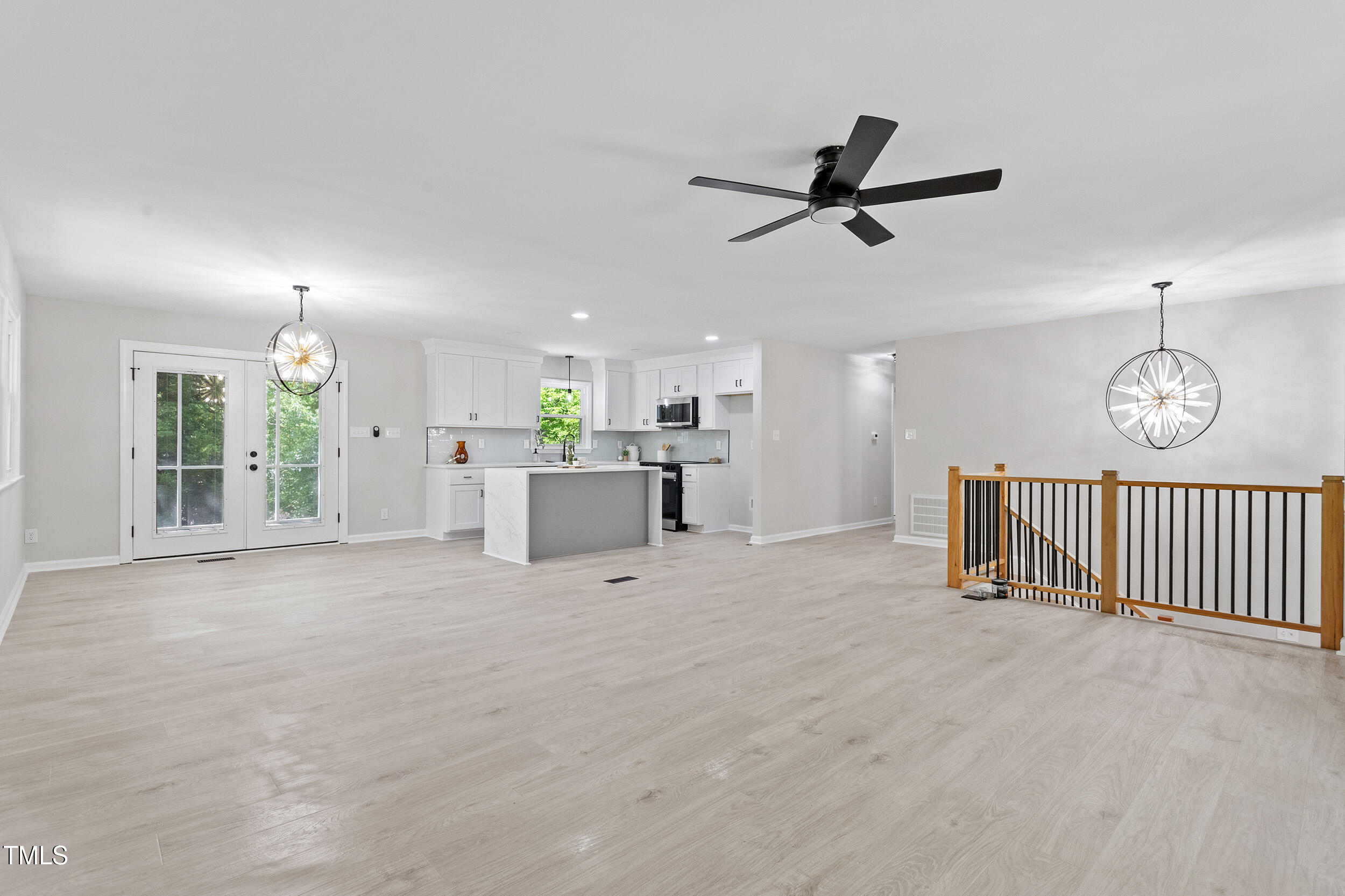1514 Goodwin Road Durham, NC 27712 - Photo 13 of 33 a view of a livingroom with a ceiling fan and window