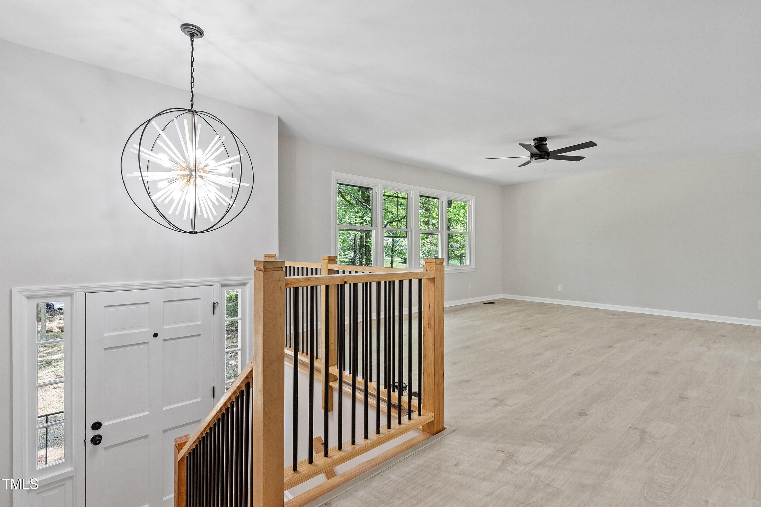 1514 Goodwin Road Durham, NC 27712 - Photo 14 of 33 a view of a hallway with windows