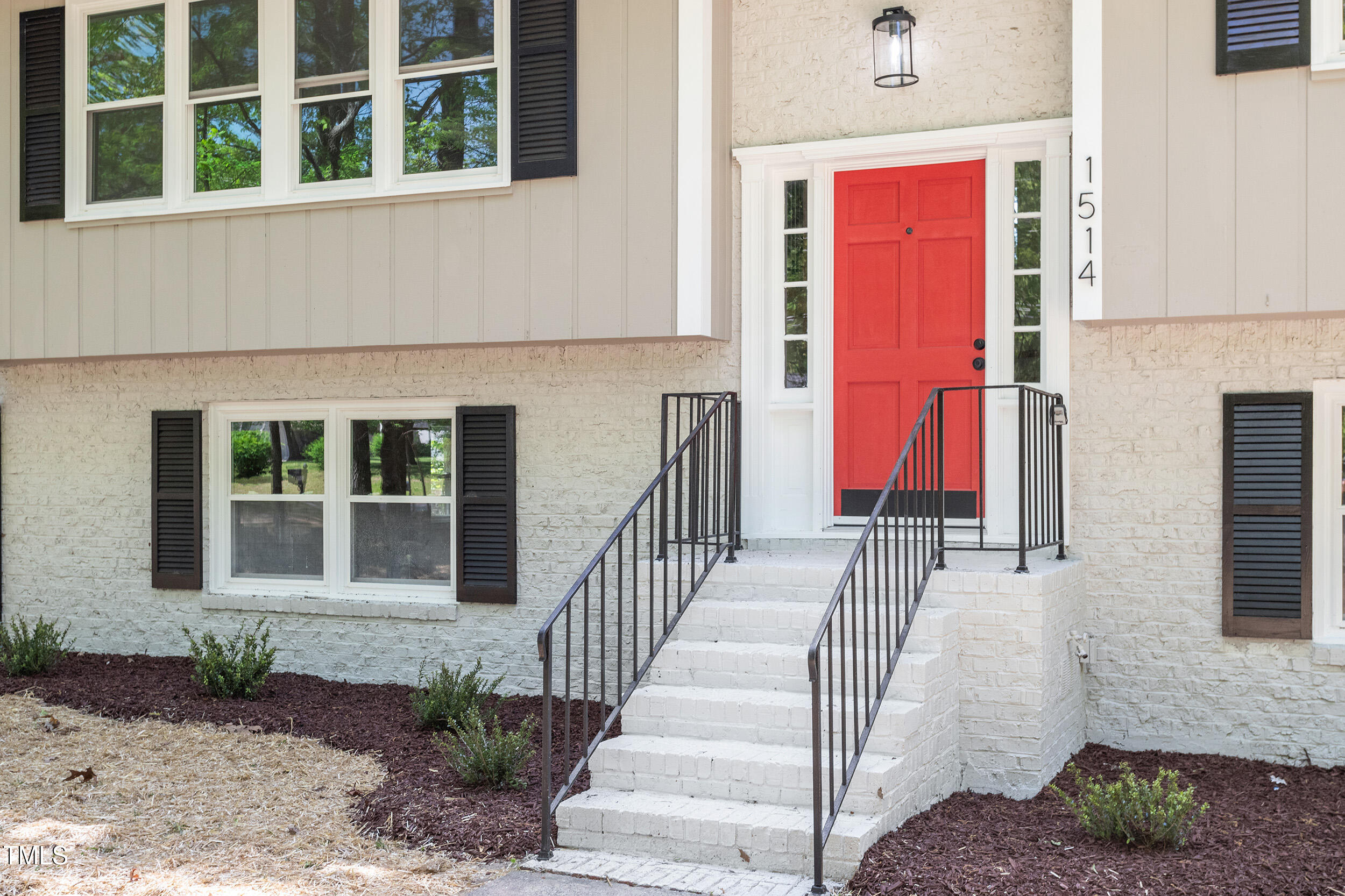 1514 Goodwin Road Durham, NC 27712 - Photo 27 of 33 a view of a house with entryway and stairs