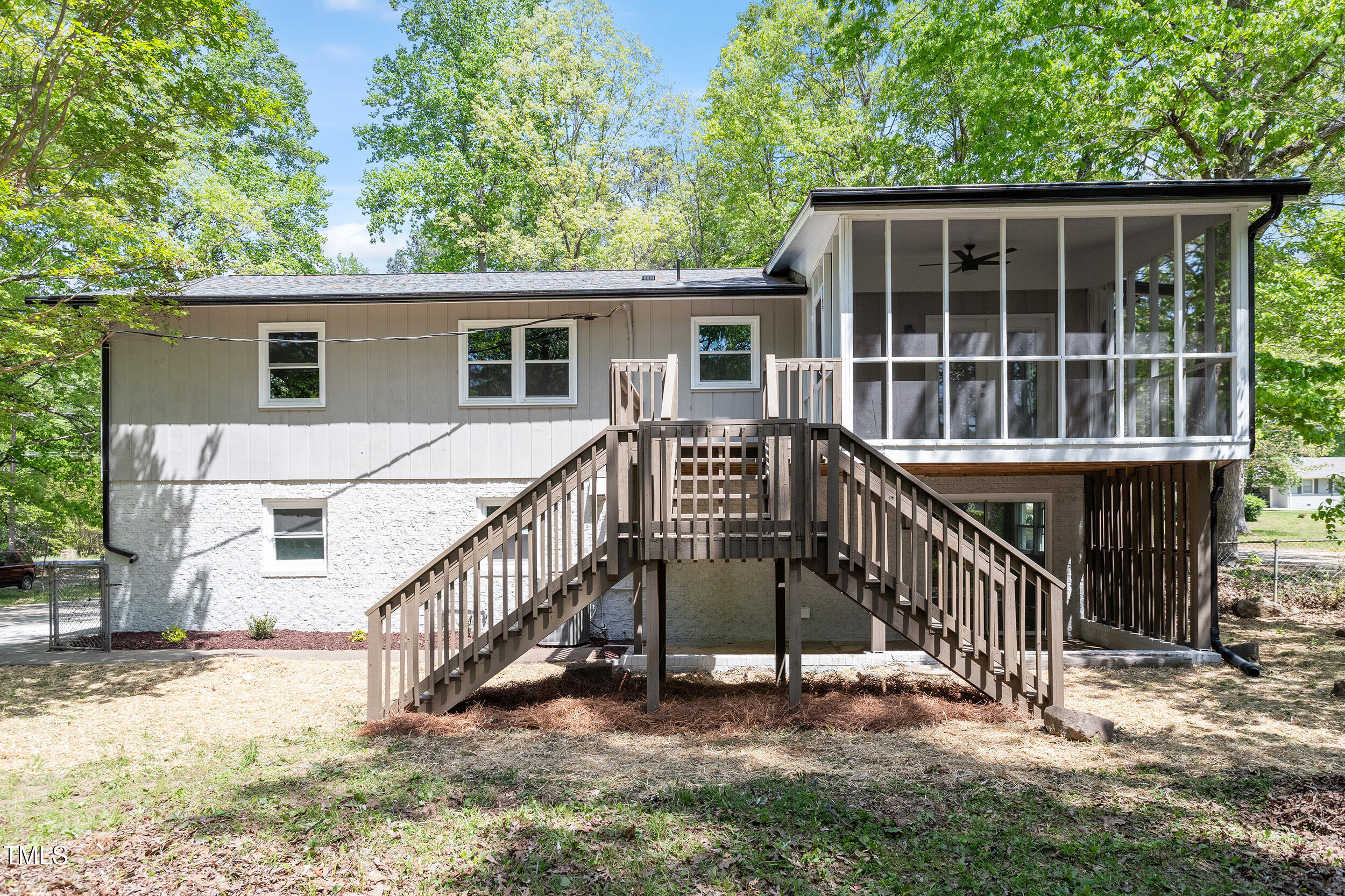 1514 Goodwin Road Durham, NC 27712 - Photo 28 of 33 a view of backyard with deck and outdoor seating