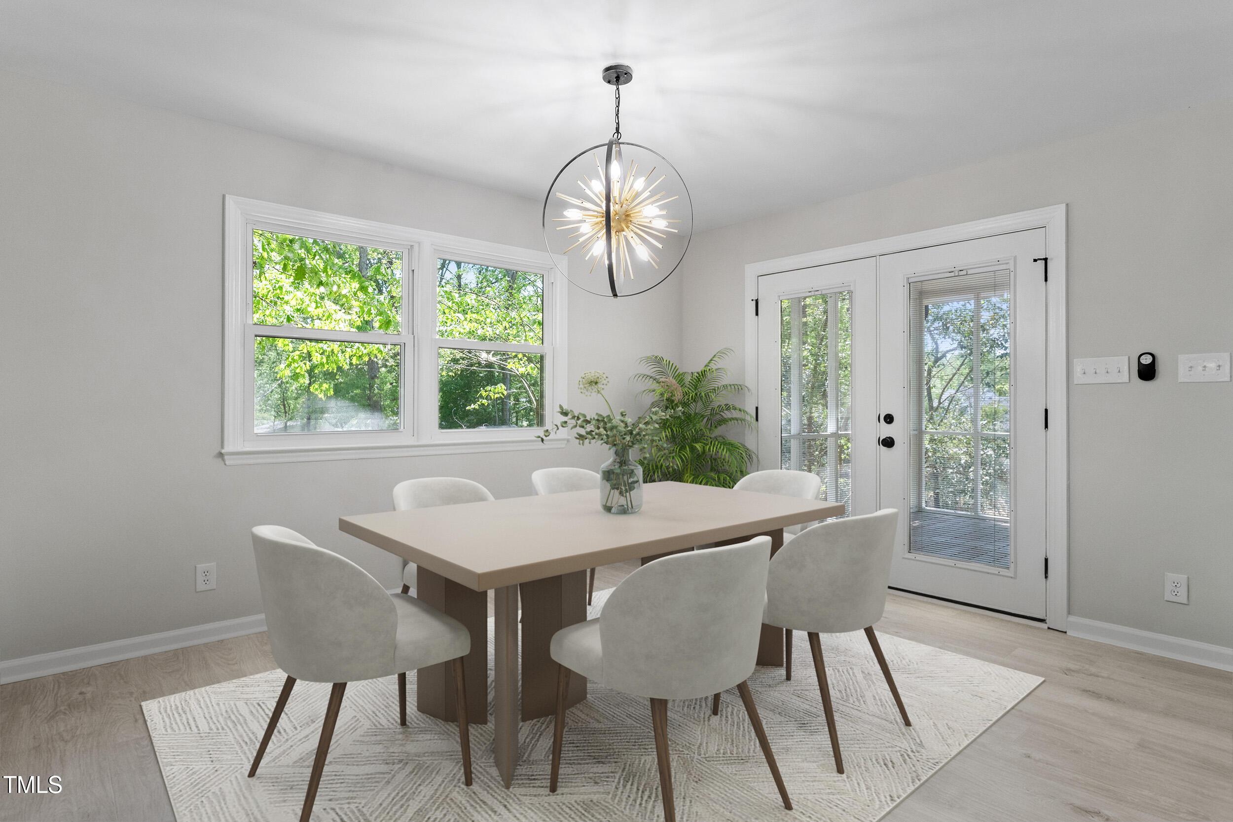 1514 Goodwin Road Durham, NC 27712 - Photo 6 of 33 a dining room with furniture a chandelier and window