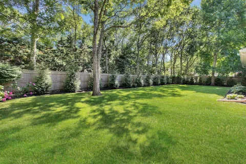 a view of a backyard with a garden
