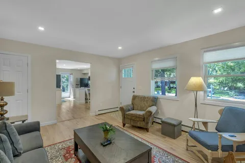 a living room with furniture and a table