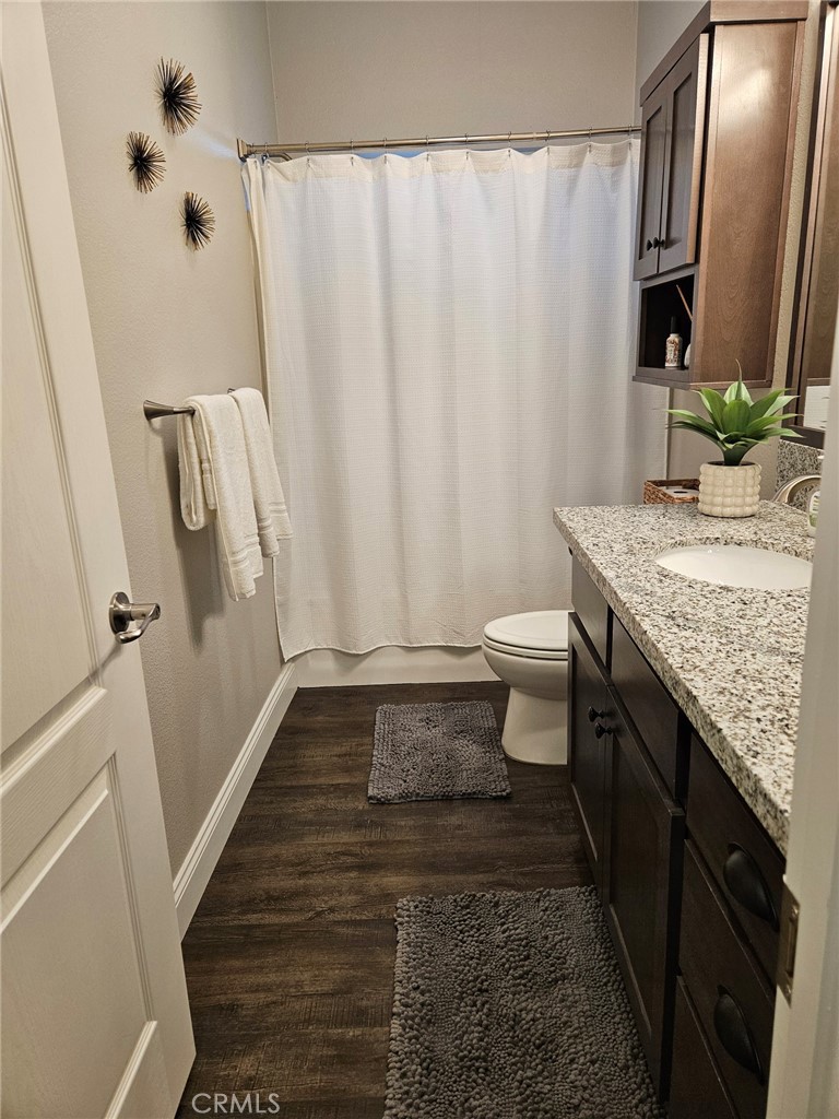 31130 South General Kearny Road Temecula, CA 92591 - Photo 5 of 18 a bathroom with a granite countertop sink and a mirror