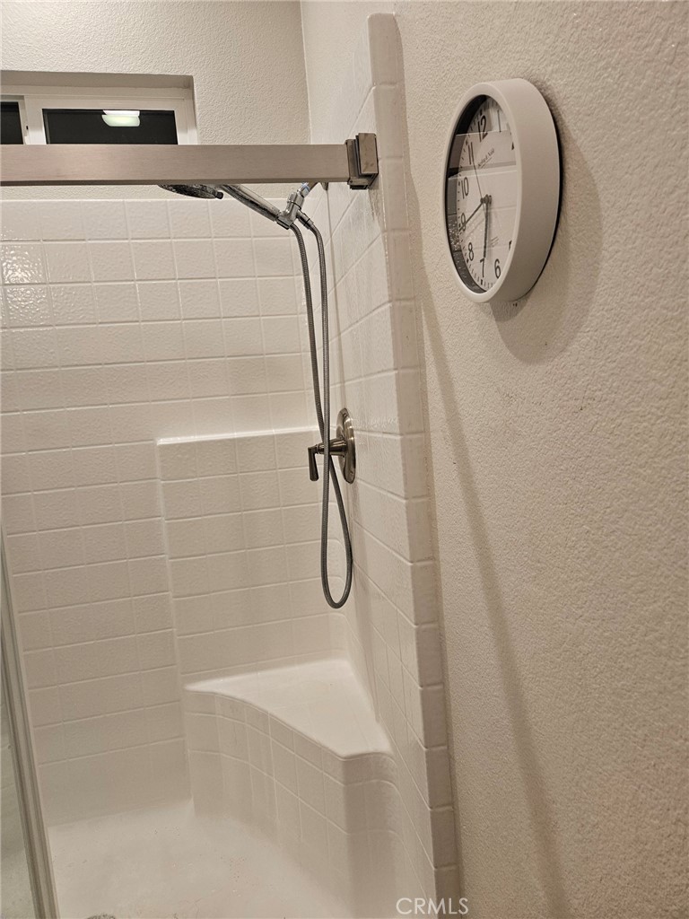 31130 South General Kearny Road Temecula, CA 92591 - Photo 9 of 18 a bathroom with a shower