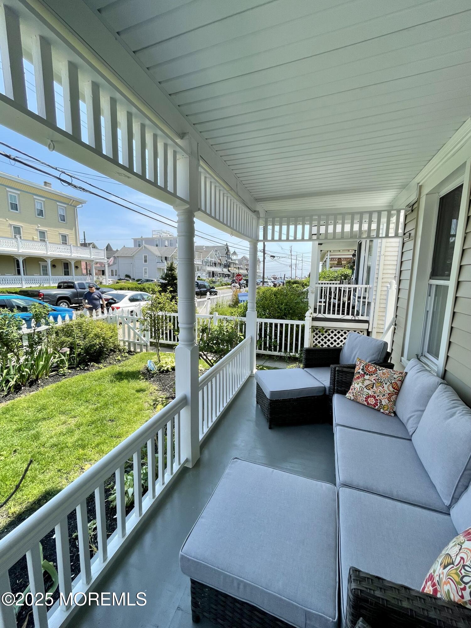 22 Embury Avenue, Unit 1 Ocean Grove, NJ 07756 - Photo 2 of 14 a view of a porch with furniture