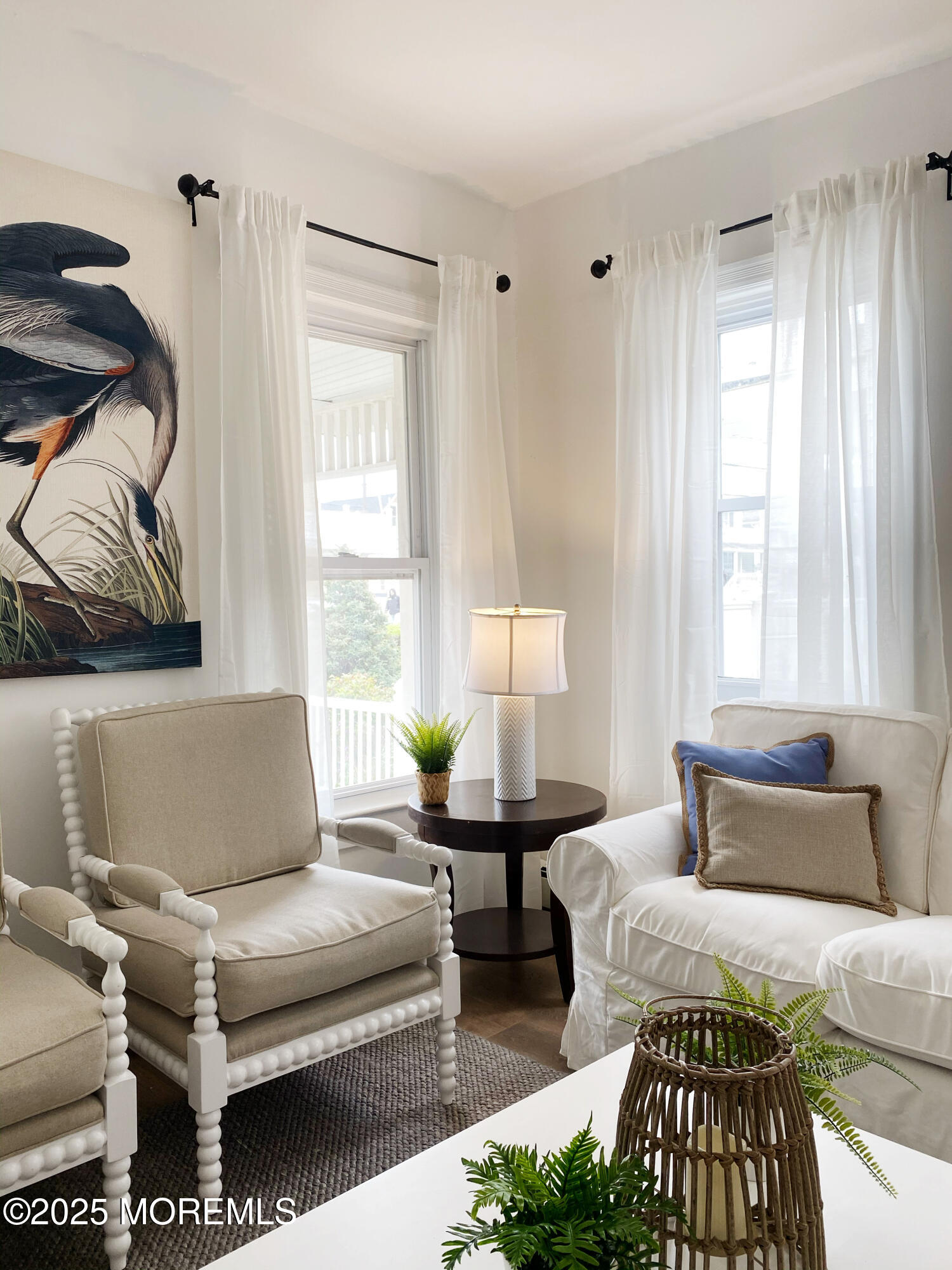 22 Embury Avenue, Unit 1 Ocean Grove, NJ 07756 - Photo 6 of 14 a living room with furniture and a window