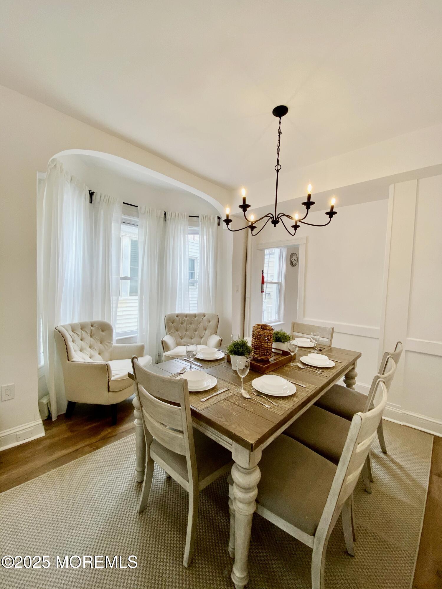 22 Embury Avenue, Unit 1 Ocean Grove, NJ 07756 - Photo 9 of 14 a dining room with furniture and window