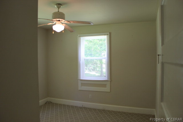 1239 Tabernacle Road Mathews, VA 23109 - Photo 10 of 22 a view of empty room with window