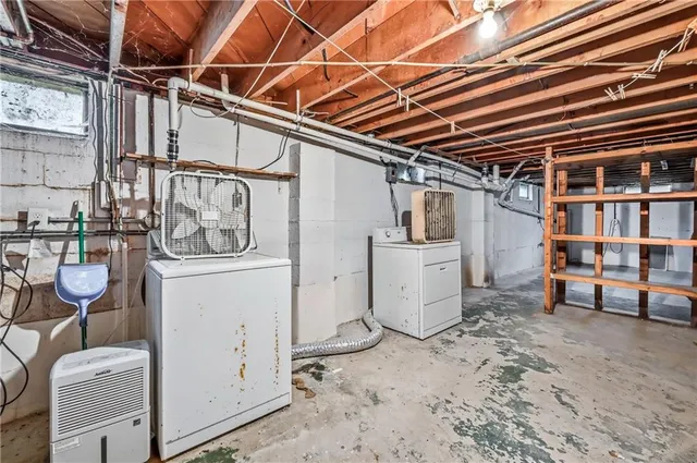 a view of a room with wooden walls