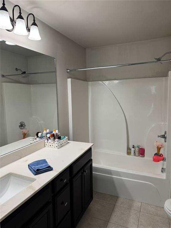1311 Brookmere Way Cumming, GA 30040 - Photo 15 of 24 a bathroom with a sink and a bathtub