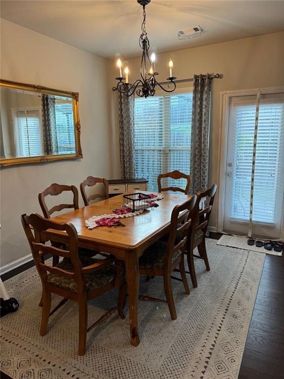 1311 Brookmere Way Cumming, GA 30040 - Photo 22 of 24 a view of a dining room with furniture
