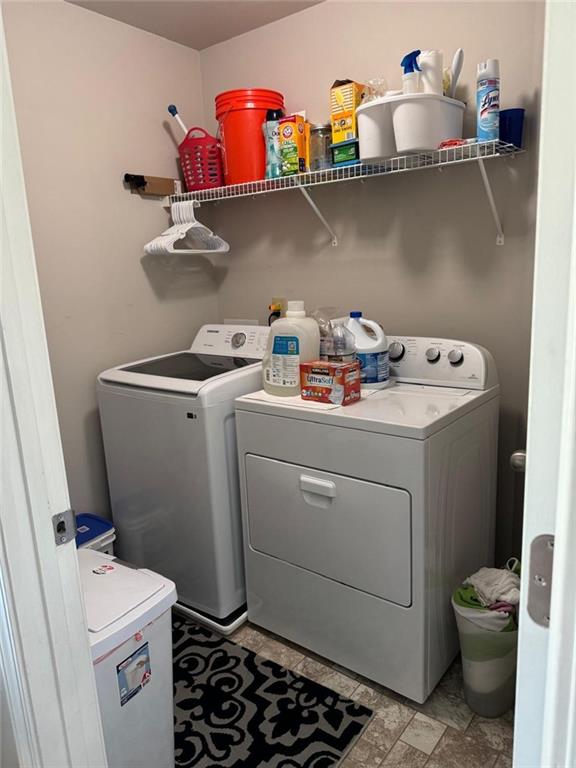 1311 Brookmere Way Cumming, GA 30040 - Photo 8 of 24 a utility room with sink dryer and washer