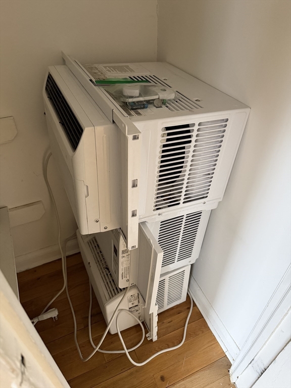 474 Cold Spring Avenue, Unit 474 West Springfield, MA 01089 - Photo 17 of 22 a view of an empty room with wooden floor and windows