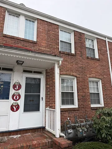 a front view of a house with an outdoor space