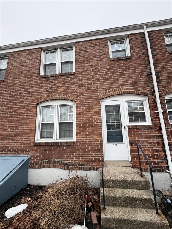 474 Cold Spring Avenue, Unit 474 West Springfield, MA 01089 - Photo 21 of 22 a front view of a house with a yard