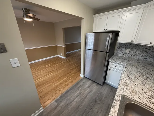 a view of livingroom with furniture and wooden floor