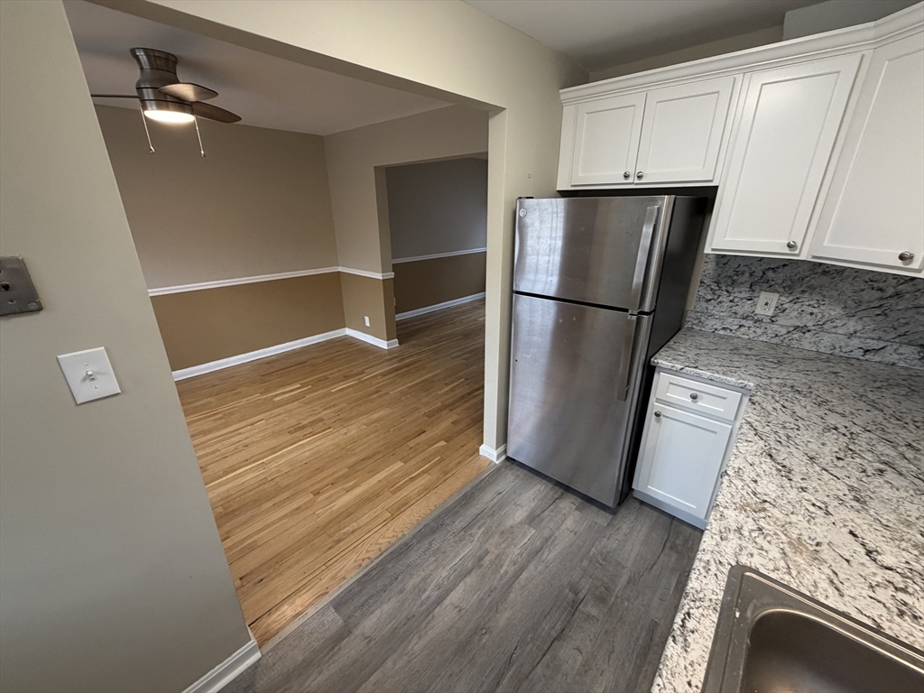 474 Cold Spring Avenue, Unit 474 West Springfield, MA 01089 - Photo 5 of 22 a view of livingroom with furniture and wooden floor