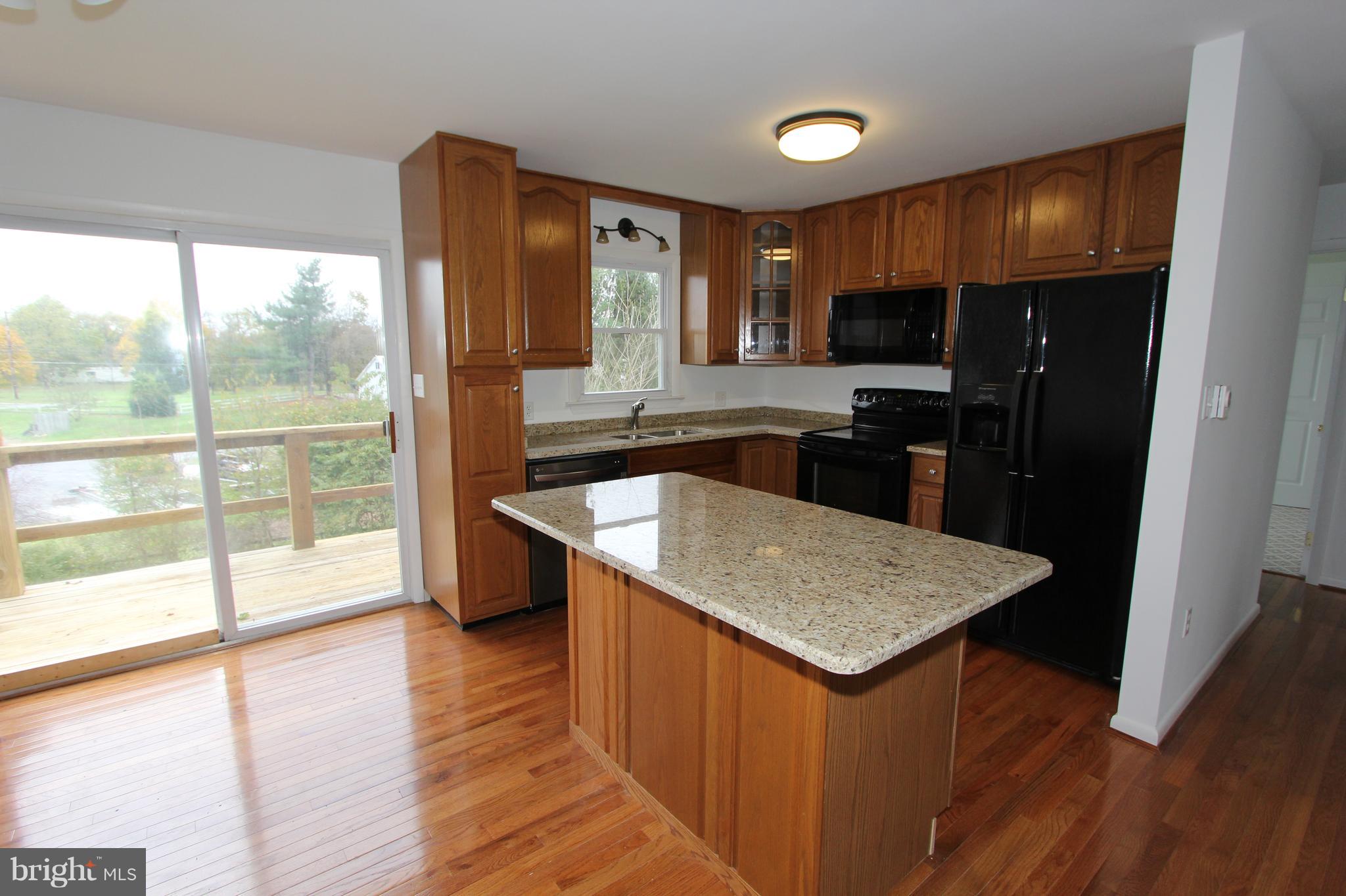 9841 Bartgis Road Frederick, MD 21702 - Photo 4 of 24 Gourmet kitchen with center island upstairs