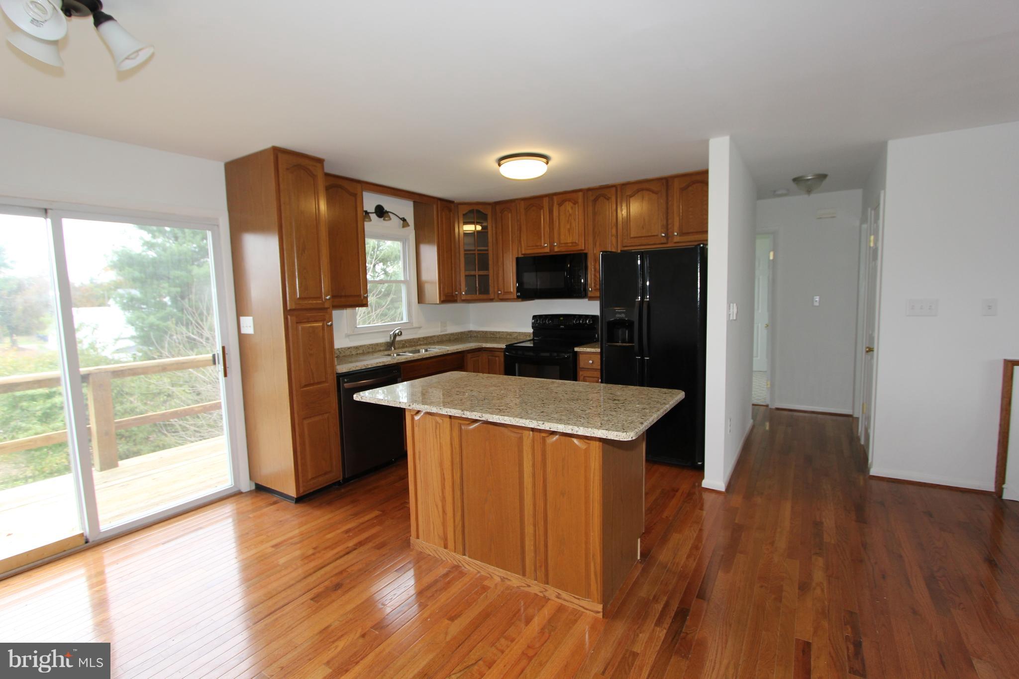 9841 Bartgis Road Frederick, MD 21702 - Photo 6 of 24 Kitchen is open to the dining and living roomos