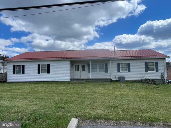 a view of a house with a garden