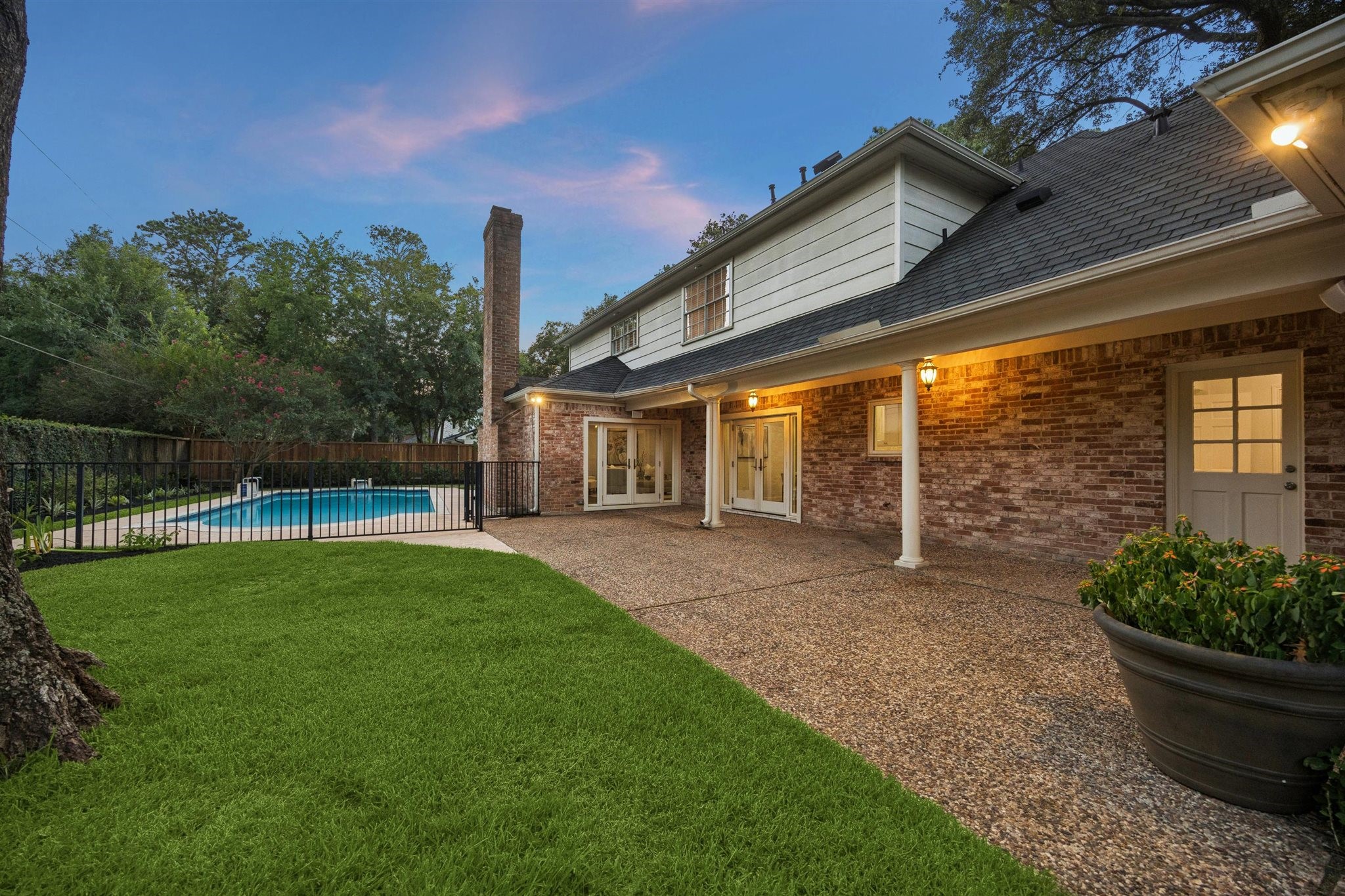 11903 Stoney Ridge Lane Houston, TX 77024 - Photo 7 of 44 Sparkling pool, spacious backyard and covered patio