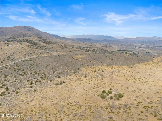 a view of ocean and mountain