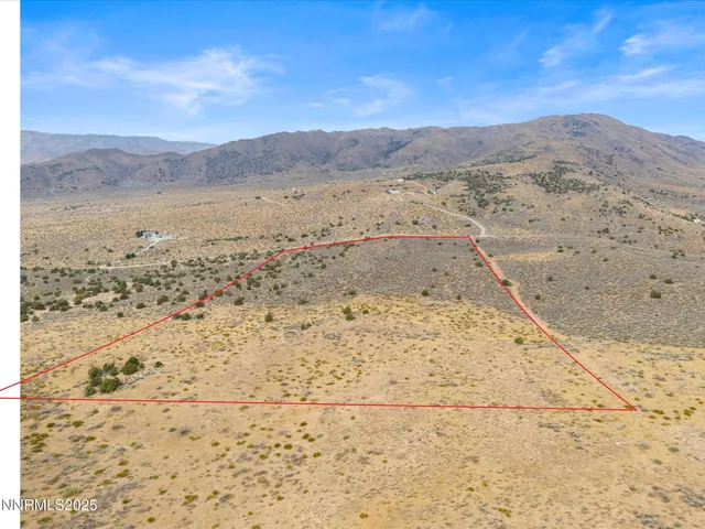 a view of beach and mountain