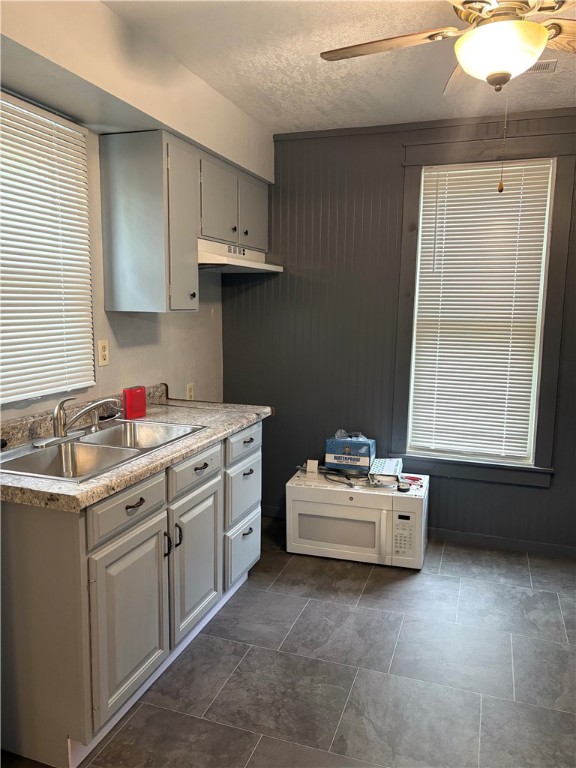 3060 Hickory Street Decatur, IL 62526 - Photo 5 of 13 a utility room with cabinets washer and dryer