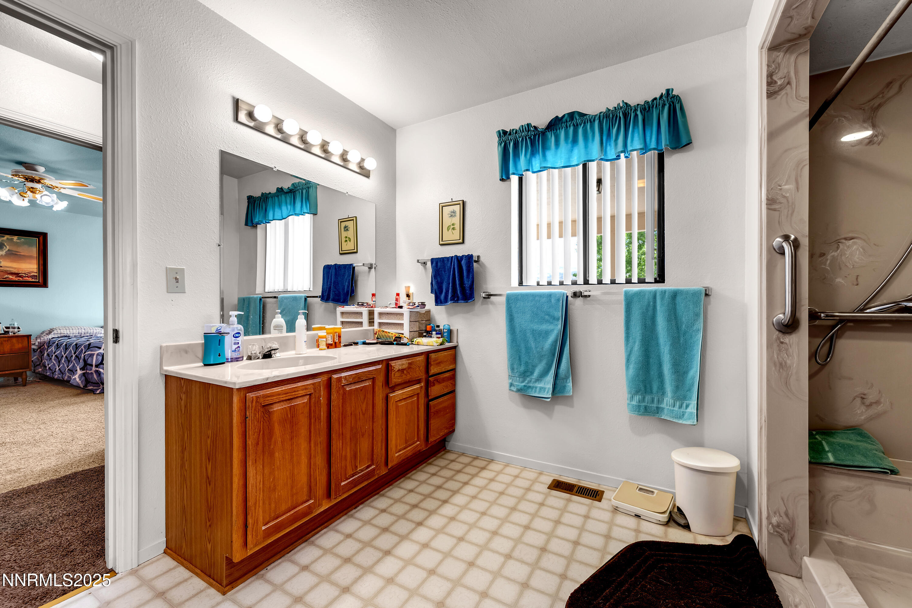 2855 Wilcox Ranch Road Reno, NV 89510 - Photo 11 of 36 a bedroom with furniture and a large window