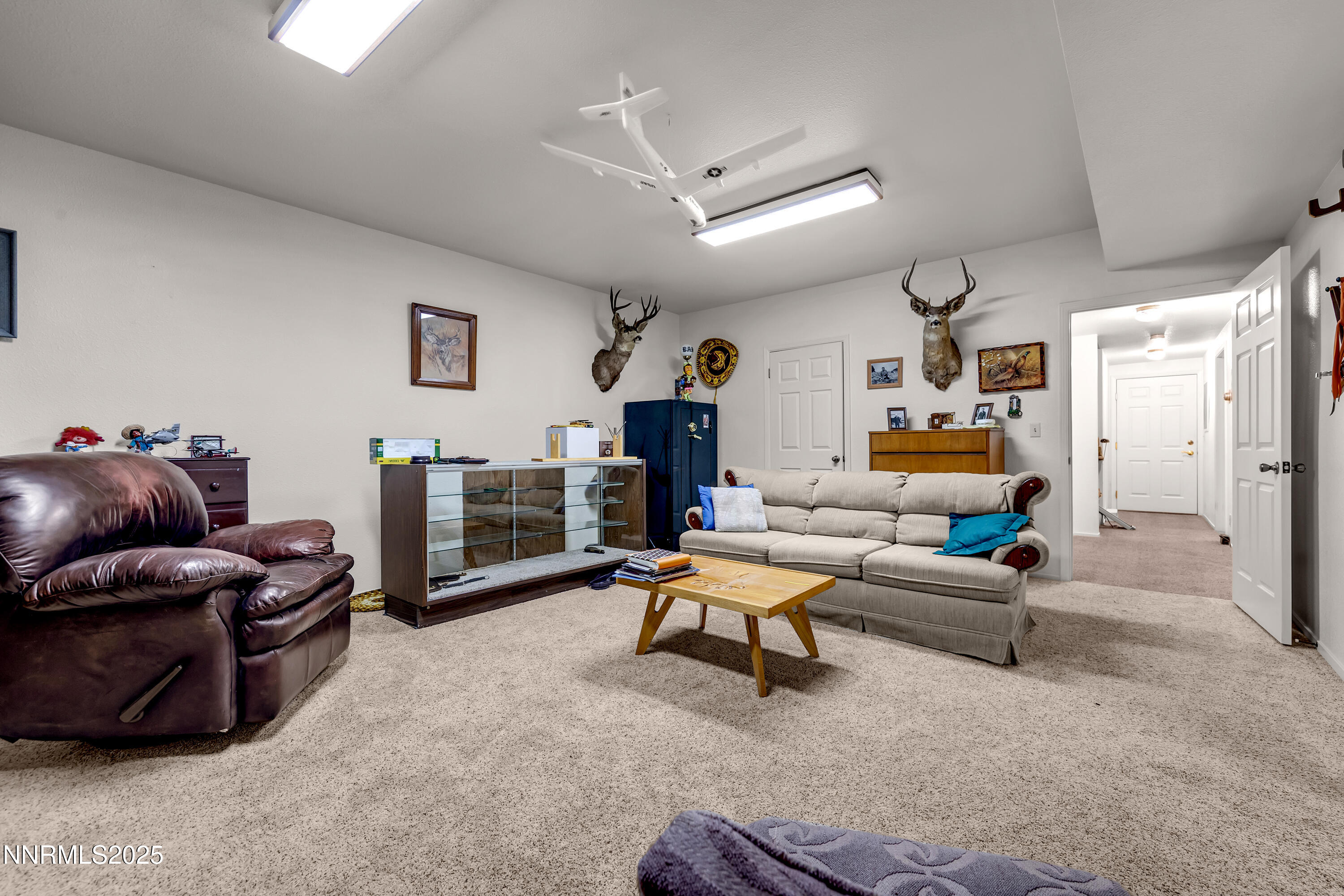 2855 Wilcox Ranch Road Reno, NV 89510 - Photo 15 of 36 a living room with furniture and a fireplace