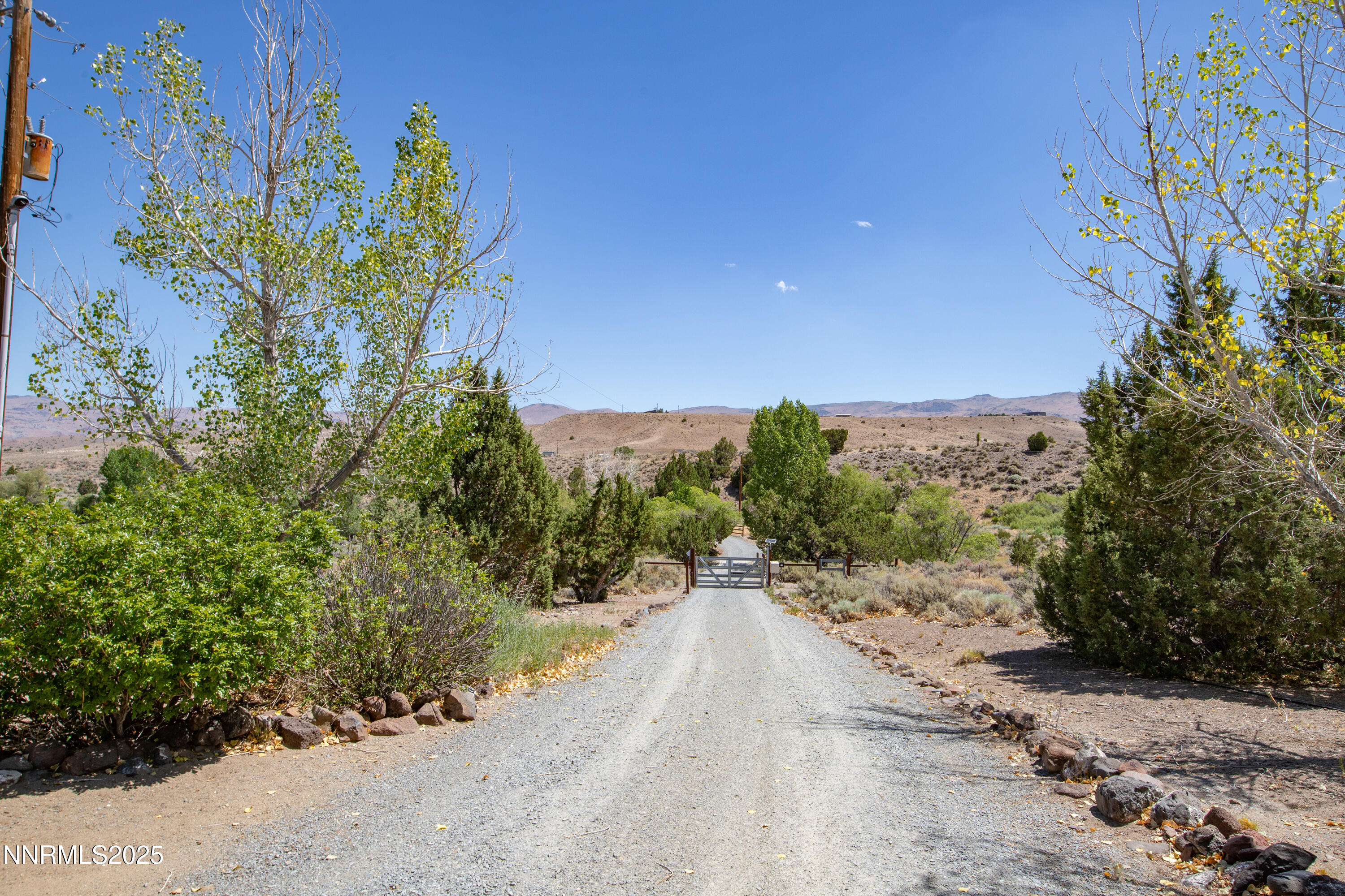2855 Wilcox Ranch Road Reno, NV 89510 - Photo 26 of 36 a view of a road with a yard