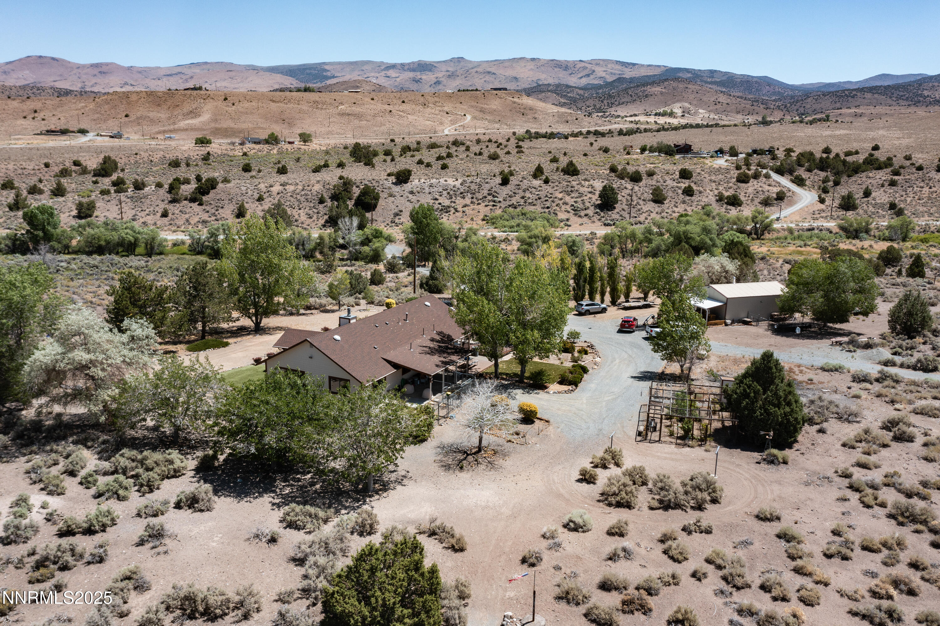 2855 Wilcox Ranch Road Reno, NV 89510 - Photo 34 of 36 a view of a forest with mountains in the background