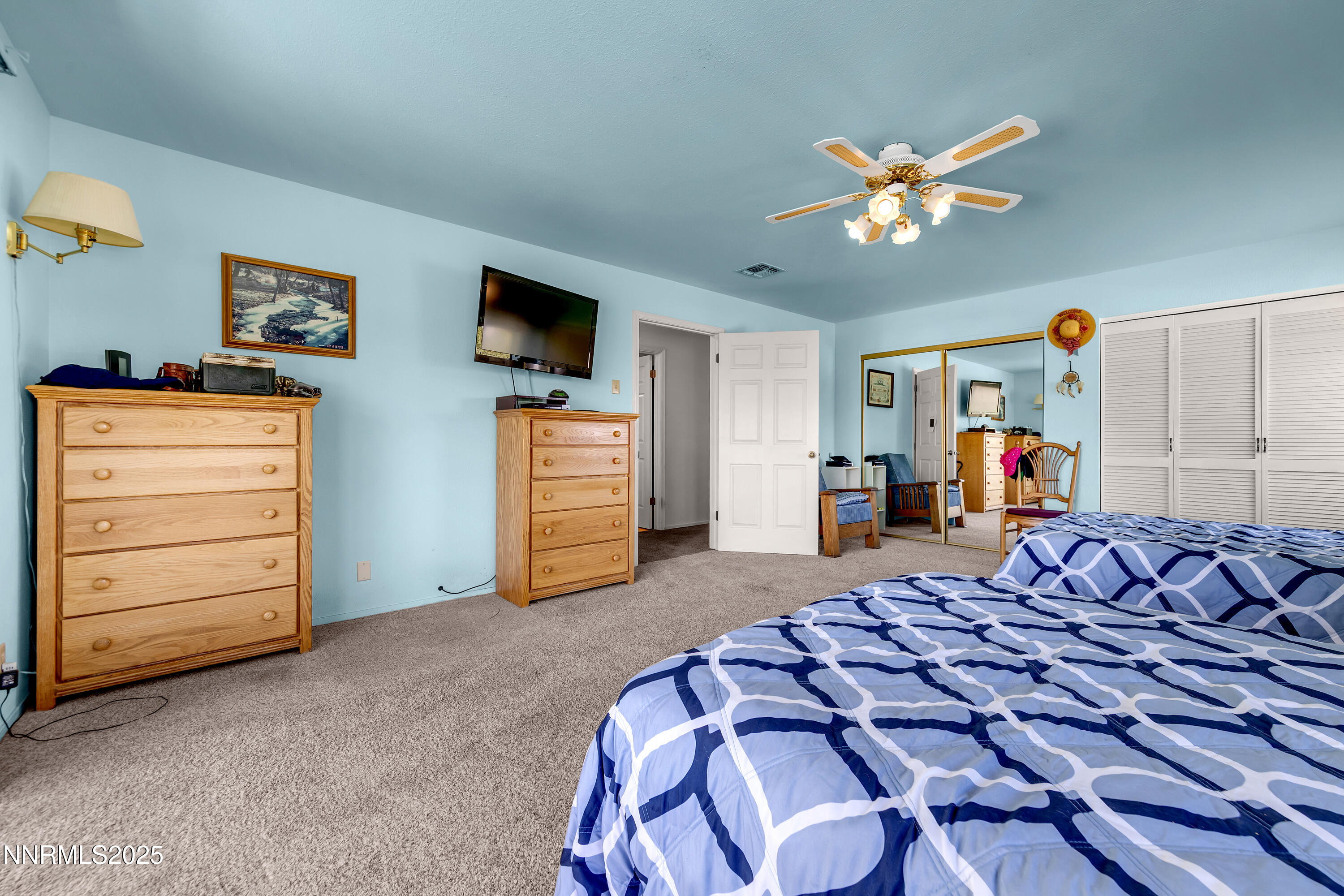 2855 Wilcox Ranch Road Reno, NV 89510 - Photo 10 of 36 a bed room with a bed and a television