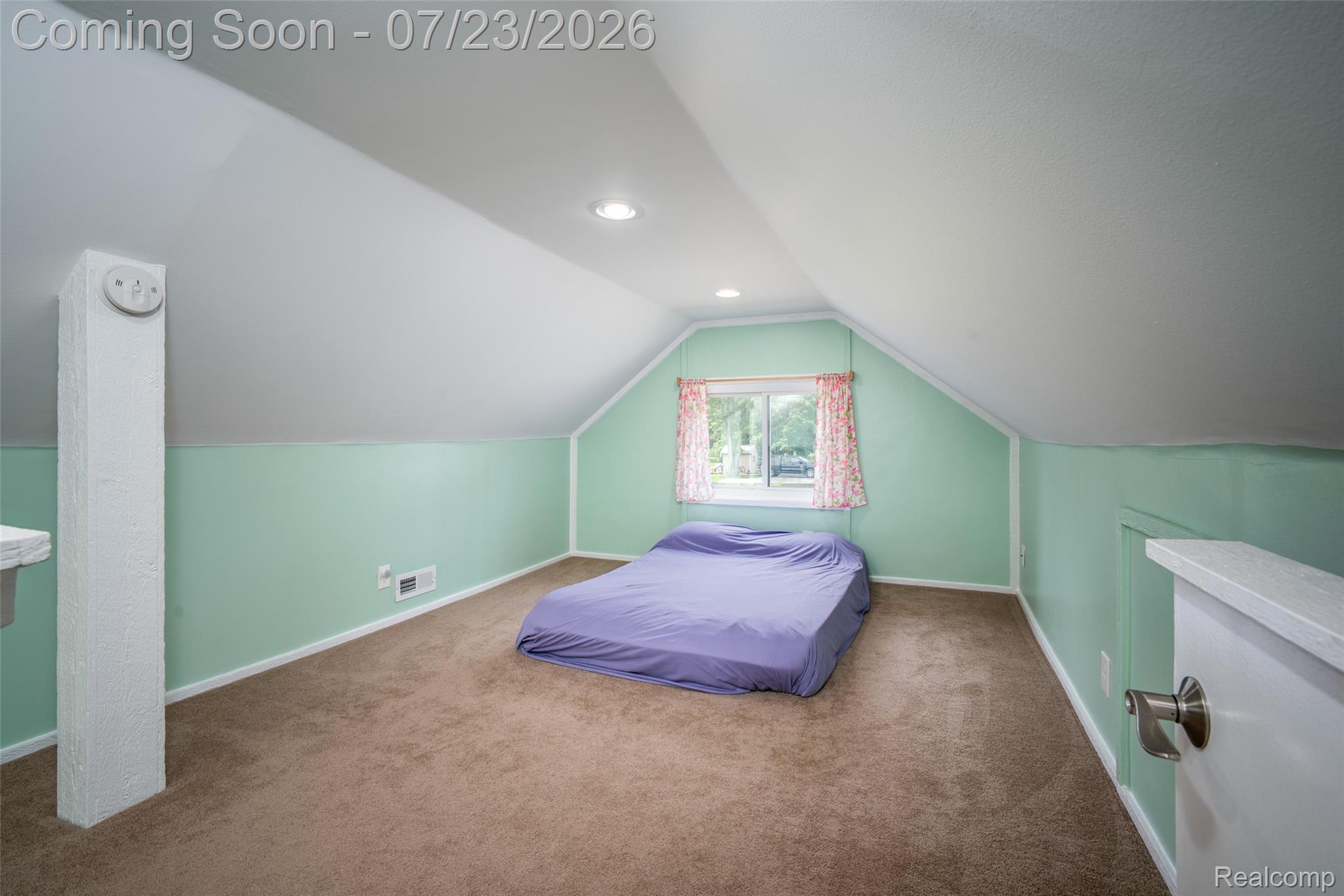 829 Francis Street Rochester, MI 48307 - Photo 16 of 25 Carpeted room featuring a single window, recessed lighting, sloped ceilings, and light green walls