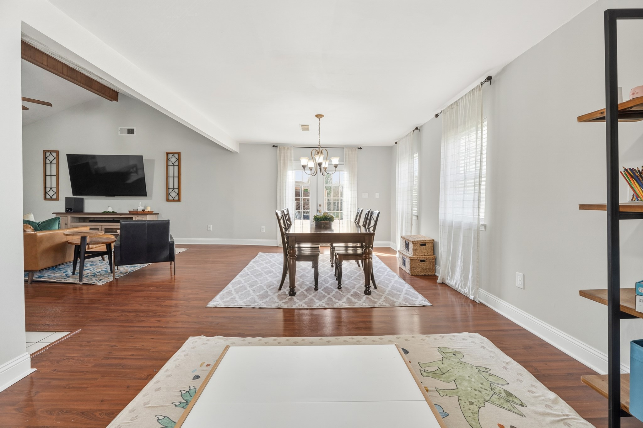 2104 Rose Road Pearland, TX 77581 - Photo 23 of 43 a living room with furniture and a flat screen tv