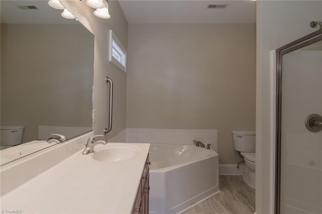 6136 Stadium Ridge Court Clemmons, NC 27012 - Photo 23 of 26 MBA with double vanity, garden tub, and separate shower