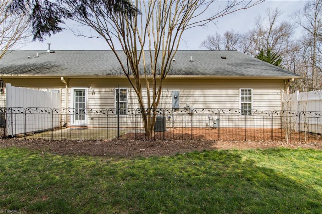 6136 Stadium Ridge Court Clemmons, NC 27012 - Photo 26 of 26 Rear Exterior with fenced in patio