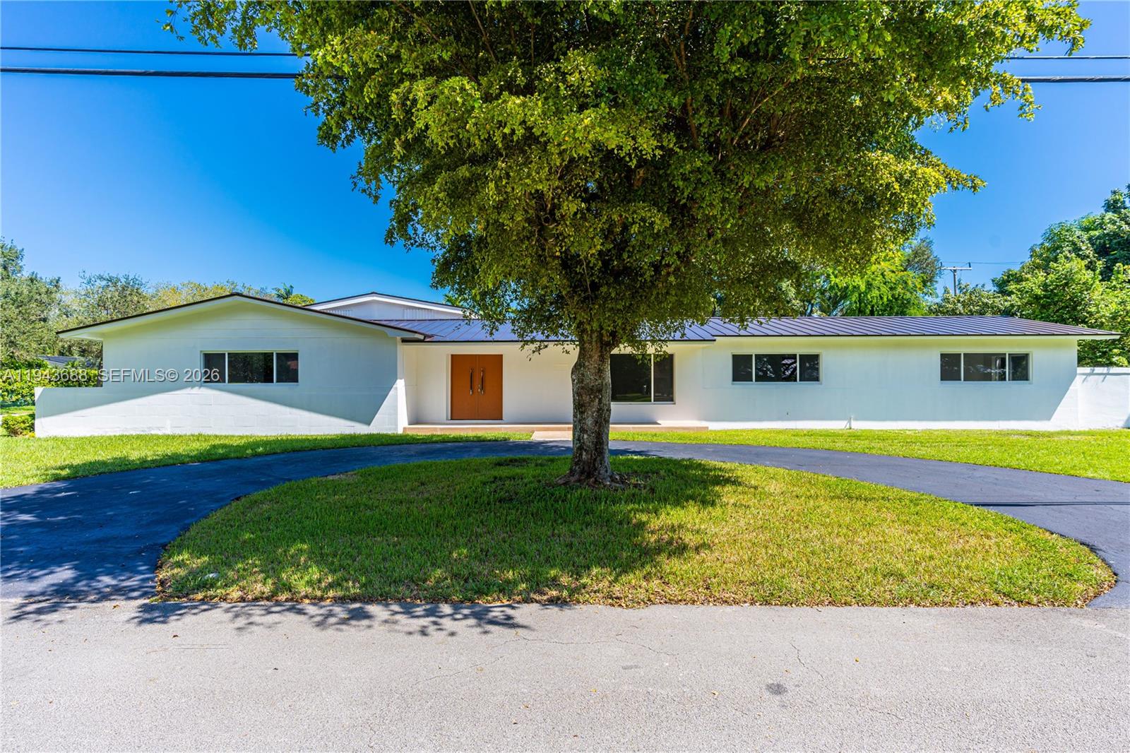 a view of a house with a swimming pool