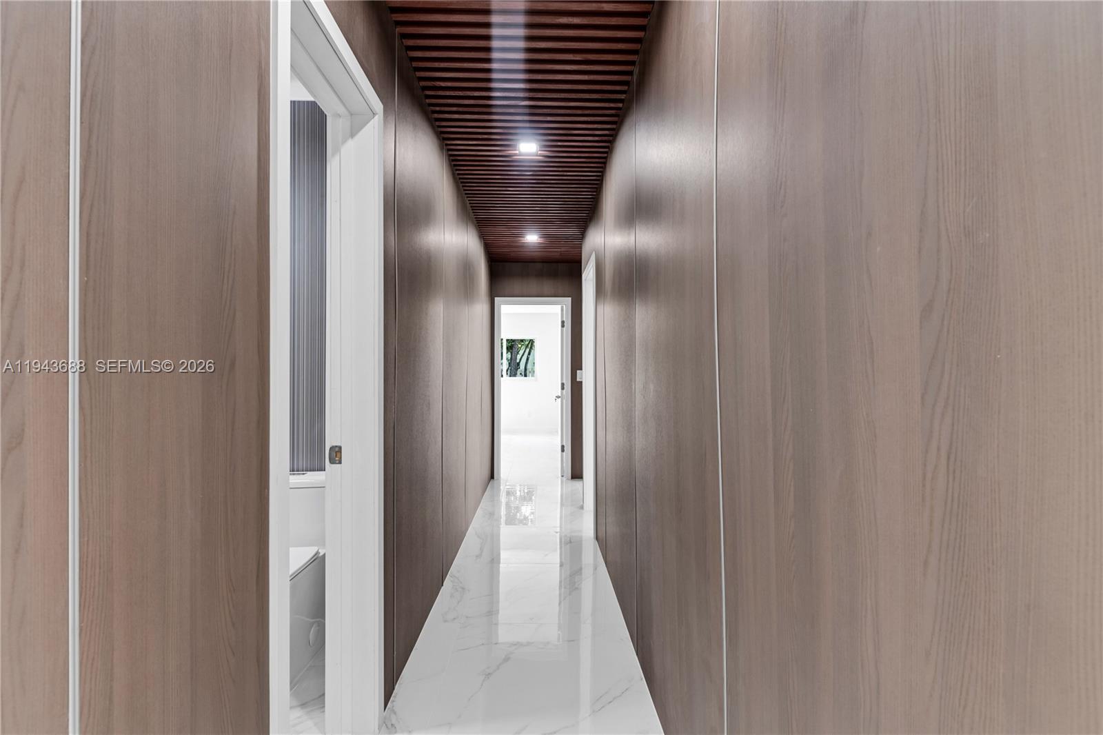 12525 Southwest 68th Court Pinecrest, FL 33156 - Photo 16 of 46 a view of hallway