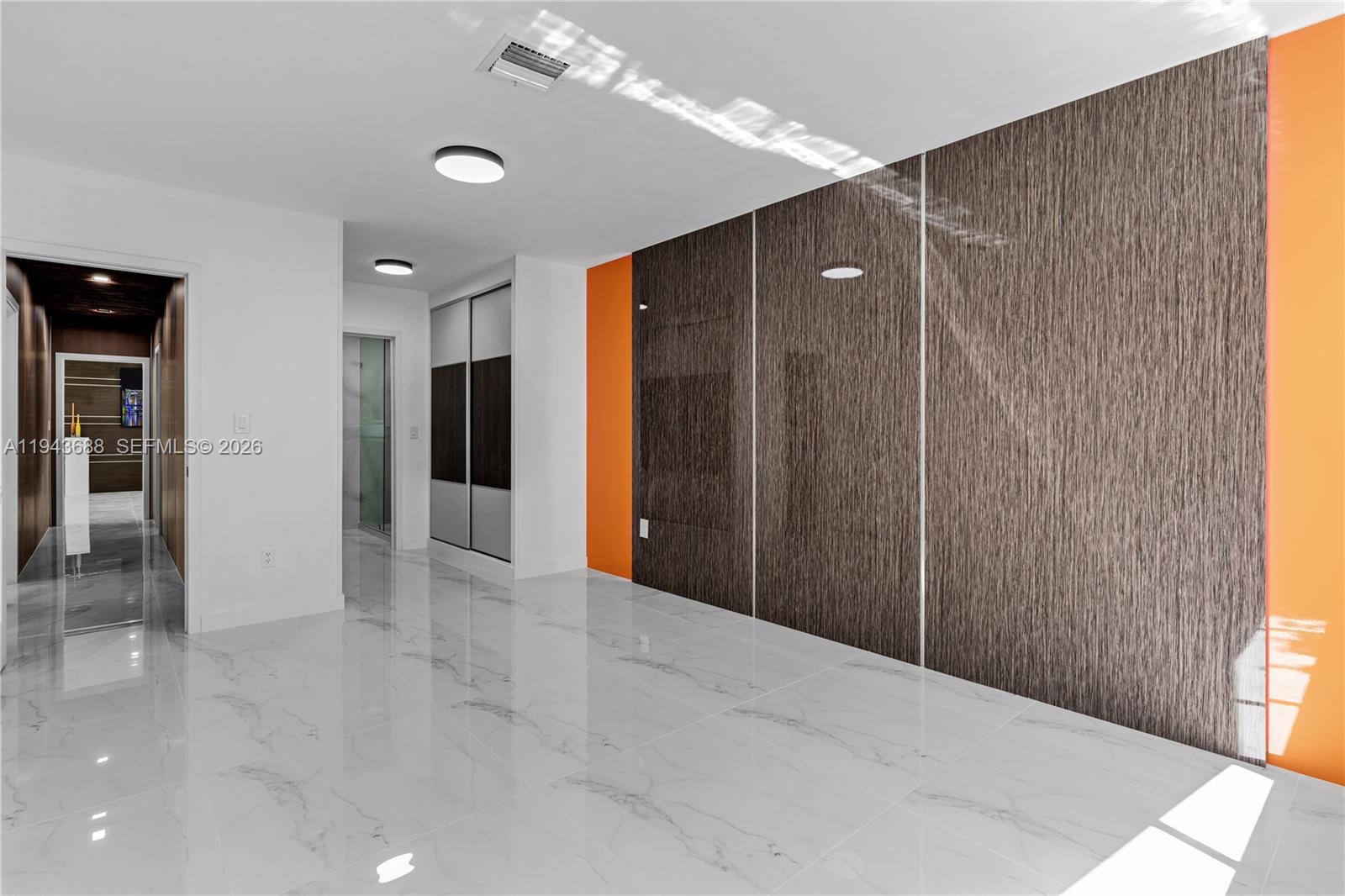 12525 Southwest 68th Court Pinecrest, FL 33156 - Photo 18 of 46 a view of a hallway