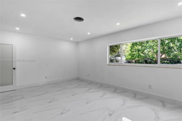 an empty room with a window